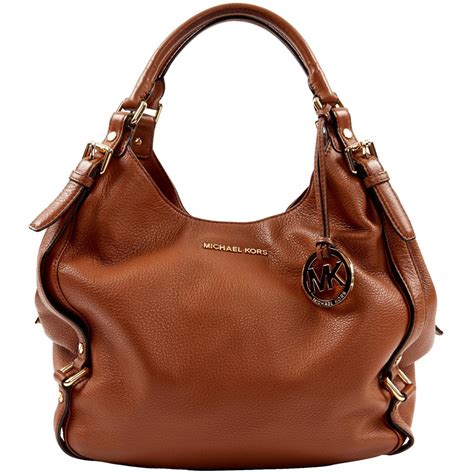 michael kors handbag charm uk|are Michael Kors purses leather.